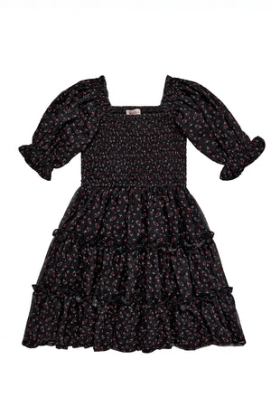 Black floral dress with puffed sleeves on a white background