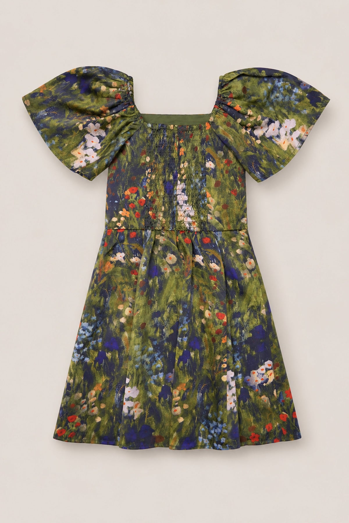 The Teen Blakely Flutter-Sleeve Dress in Impressionist Bloom by Ivy City Co is a short satin dress with flutter sleeves, showcasing a vibrant mix of green, blue, and red floral patterns on a light background—an eye-catching piece to brighten up your fall wardrobe.