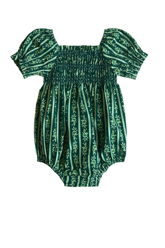 The Ivy City Co Baby Sunday Best Romper in Pine Felicity Floral features short puff sleeves and a shirred, stretchy bodice for comfort and style. Crafted from the enchanting Pine Felicity Floral fabric with vertical stripes, this romper adds a whimsical touch to any day. The delicate floral pattern stands out beautifully against the crisp white background.