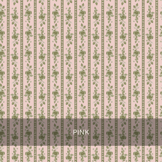 Vertical green floral stripes with dotted borders adorn a light pink background in the Felicity Floral Wallpaper by Loomwell. The word “PINK” is displayed in white text, centered within a dark transparent box near the bottom. This charming wallpaper design from Loomwell Home Goods is perfect for refreshing any space and is available as removable wallpaper for effortless installation and updates.