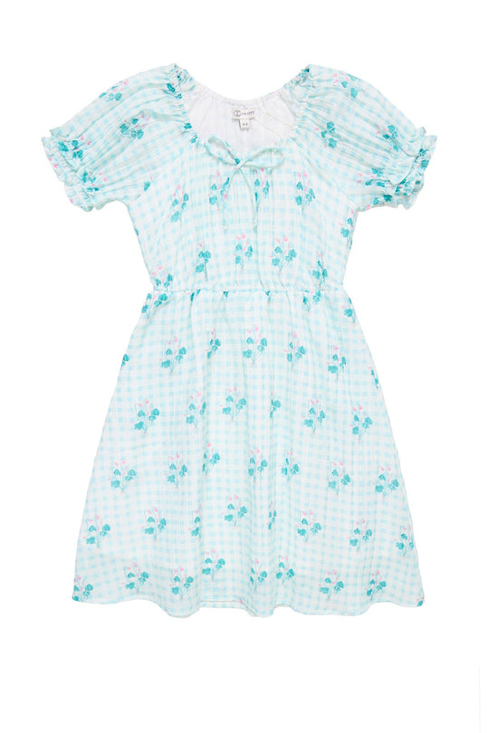 The Mini Jessie Dress in Bloom Gingham by Ivy City Co is a light blue and white short-sleeved gingham dress adorned with small blue floral prints, featuring a checked pattern, gathered waist, and a charming neckline bow—an ideal choice for a girls spring dress.