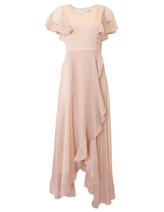 The Callie Dress in Champagne Chiffon by Ivy City Co is a light pink, floor-length bridesmaid dress featuring short flutter sleeves and a ruffled, asymmetrical hem. Crafted from soft and flowing chiffon, this dress is designed with a flattering fitted waist for an effortlessly elegant look.