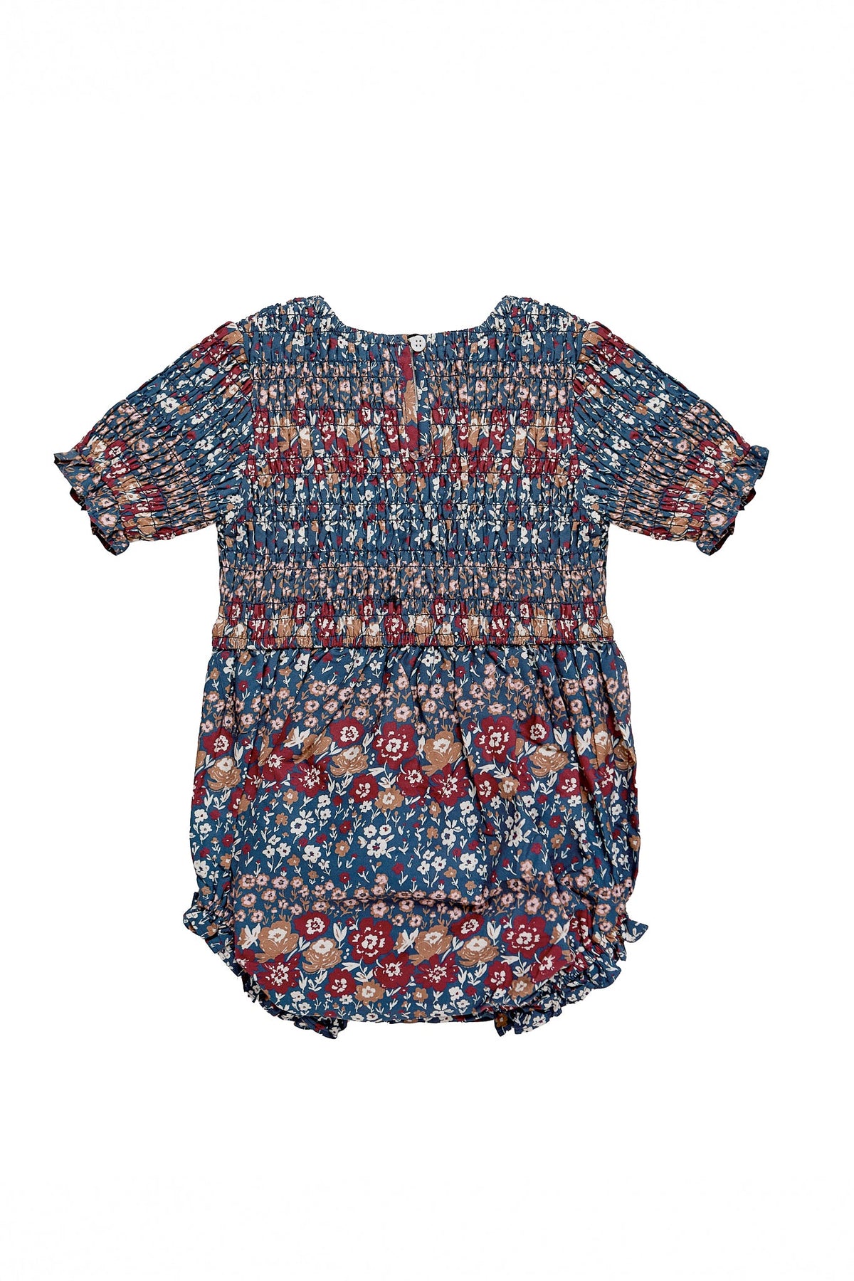 The Ivy City Co Baby Parker Romper in Dusk Floral Medley features short sleeves, ruffled leg openings, and an elegant smocked bodice. Made from lightweight cotton, this romper displays a blue base covered in a delicate multicolored floral print in shades of red, white, and brown. The garment is shown laid flat on a white background to clearly highlight its details.