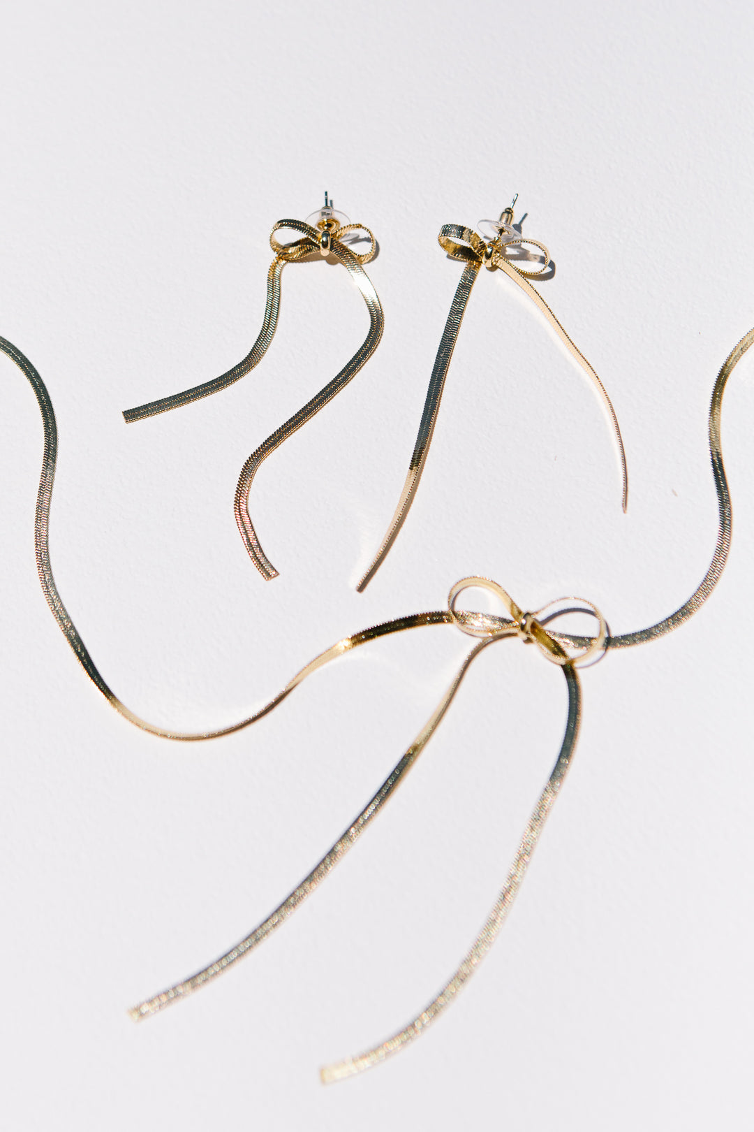 Long Herringbone Bow Earrings