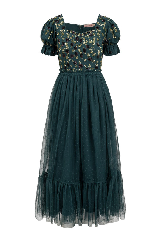 The Adara Dress in Green by Ivy City Co is a teal midi dress featuring puff sleeves, a square neckline, and delicate floral embroidery on the bodice, paired with a sheer polka-dot tulle skirt and ruffled hem for a classic embroidered gown look.