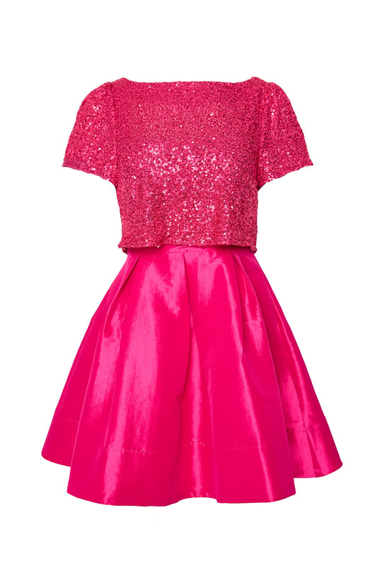 Pink sequin dress against white background