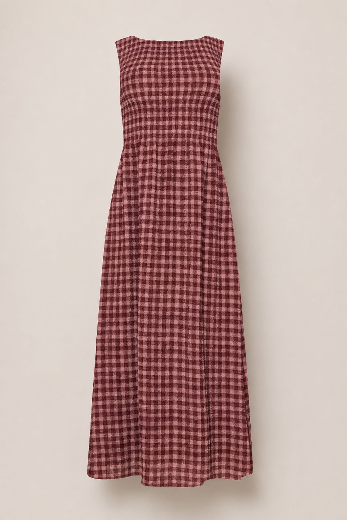 The Ana Dress in Cranberry Popcorn Plaid by Ivy City Co is a sleeveless, ankle-length dress with a maroon and pink checkered pattern, featuring a comfortable smocked bodice and a flared skirt. Displayed on a plain light background, this style is also maternity friendly.