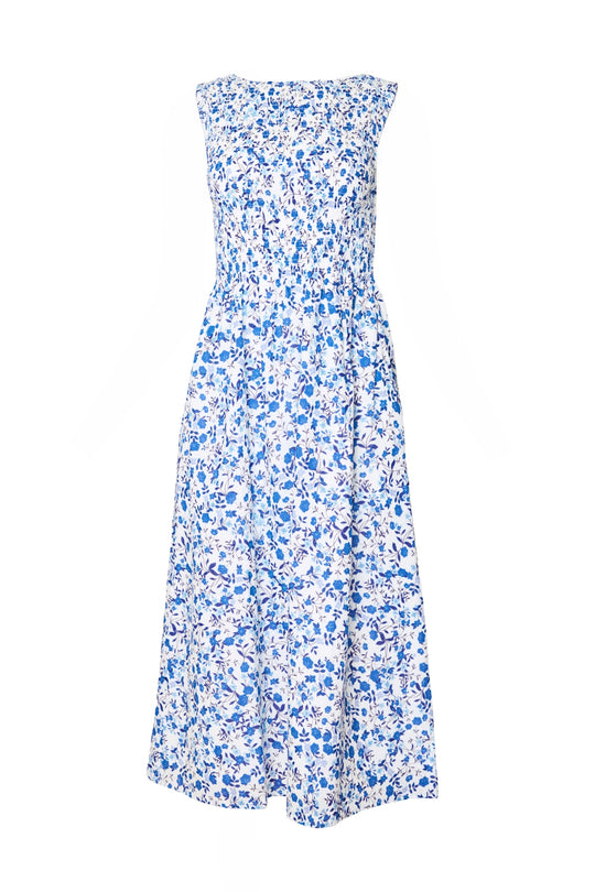 The Ana Dress in Ditsy Cobalt Floral by Ivy City Co is a sleeveless, ankle-length cotton maternity dress with a fitted bodice, flared skirt, and white background with blue floral print—perfect for comfortable summer style.