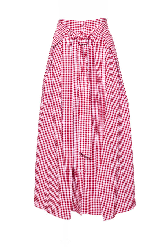 The Angela Skirt in Red Gingham by Ivy City Co features a high waist, front fabric belt, and pleated, knee-length design. Its loose, flowy fit makes it an ideal summer staple.