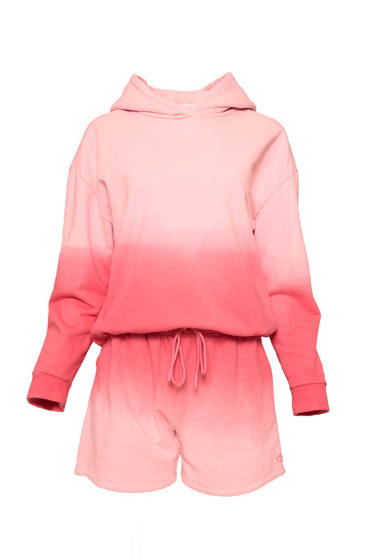 pink sweatsuit against a white background