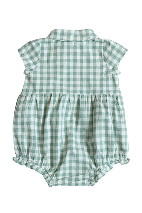The Baby Amber Romper in Sage Gingham by Ivy City Co features a classic green and white checkered pattern, short sleeves, collar, gathered waist, and elastic leg openings. Soft cotton design shown flat with the back side visible.