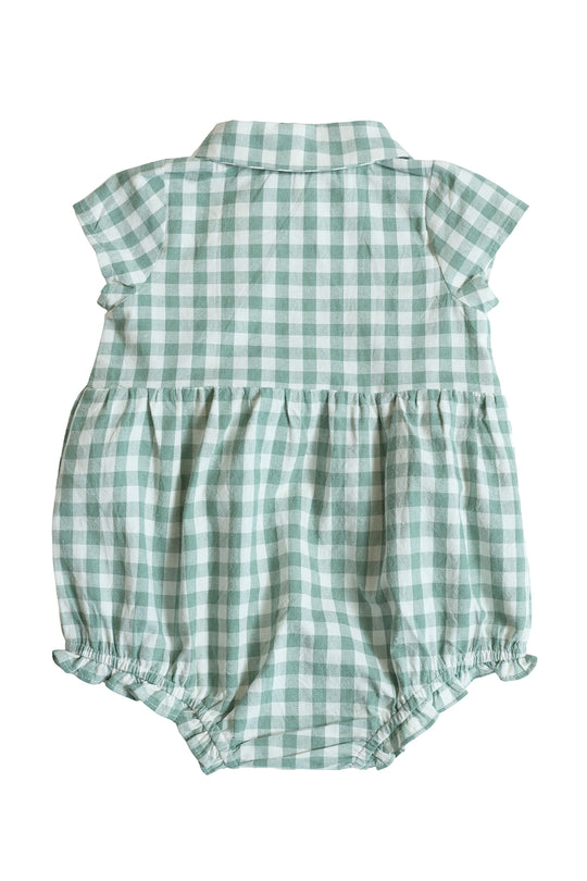 The Baby Amber Romper in Sage Gingham by Ivy City Co features a classic green and white checkered pattern, short sleeves, collar, gathered waist, and elastic leg openings. Soft cotton design shown flat with the back side visible.