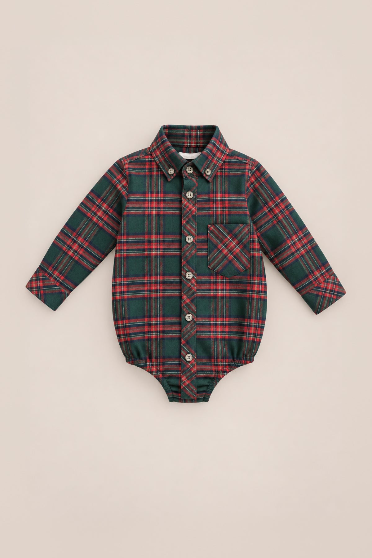 Dress your little one in festive style with the Ivy City Co Baby Boys John Romper in Evergreen Plaid. Featuring a classic red and green plaid pattern, this long-sleeve bodysuit is designed with a button-down front, collar, and chest pocket—making it the perfect baby holiday outfit. Expertly crafted from 100% cotton for all-day comfort.