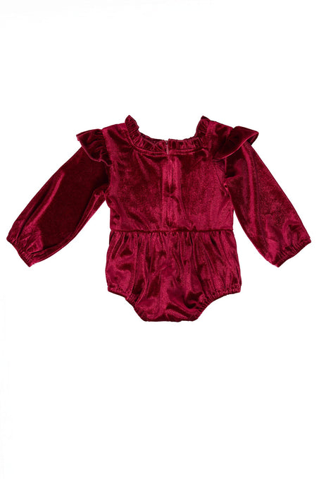 red velvet baby romper against a white background