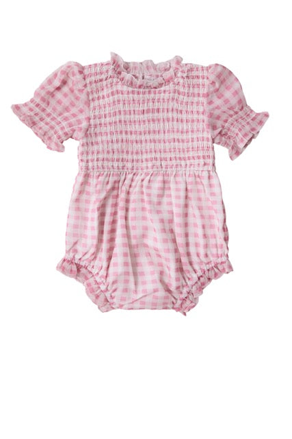 The Baby Cordelia Romper in Desert Rose Gingham by Ivy City Co features short puffed sleeves, a ruffled neckline, and gathered elastic leg openings—an adorable pink and white spring outfit shown on a white background.