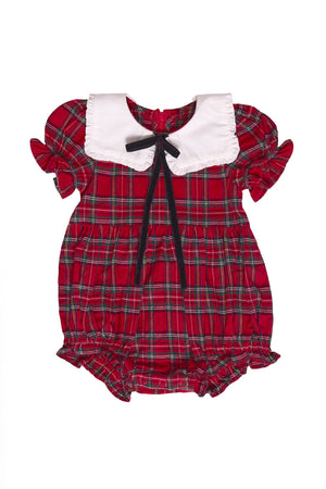 Red plaid baby romper with white collar and black bow on a white background