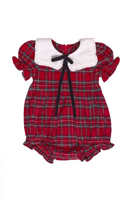 Red plaid baby romper with white collar and black bow on a white background