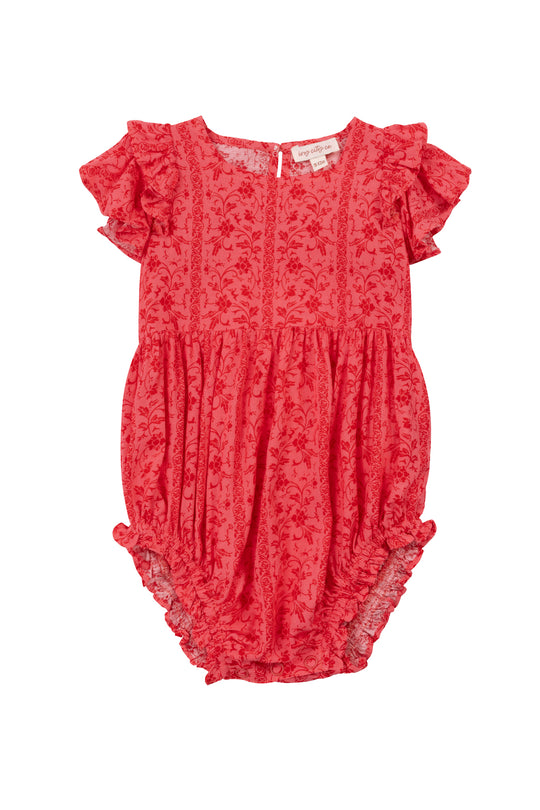 The Ivy City Co Baby Hattie Romper in Crimson Pink features short ruffled sleeves, a floral print, gathered waist, and elastic leg openings. Made from soft cotton, this cute outfit is shown on a white background.