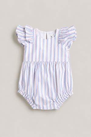 The Ivy City Co Baby Hattie Romper in Heritage Stripe features short ruffled sleeves, gathered leg openings, and blue, red, and white stripes—a perfect Fourth of July outfit for your baby. Shown laid flat on a neutral background.