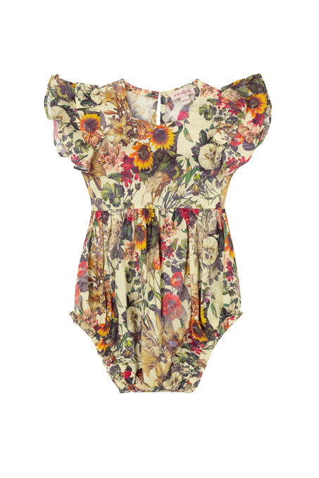 The Ivy City Co Baby Hattie Romper in Rose Vine has ruffled sleeves and a vibrant floral print in yellow, red, orange, and green on a light background, plus diaper snaps for easy changing.