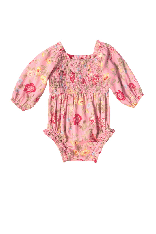 The Ivy City Co Baby Madeline Romper in Pink Vintage Poppies features long puffed sleeves, a smocked bodice, ruffled leg openings, and soft fabric decorated with red, yellow, and white flowers for a sweet look.