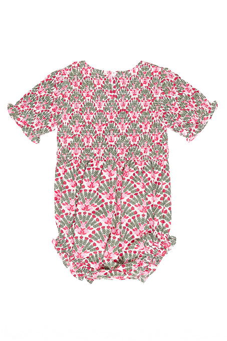 Floral patterned baby romper on a white background