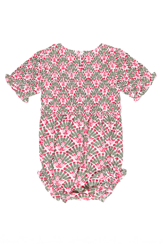 Floral patterned baby romper on a white background