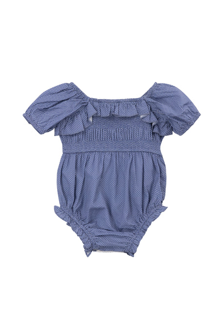 The Ivy City Co Baby Rae Romper in Blue Polka Dot features short puff sleeves, a ruffled neckline, smocked bodice, bow accents, elasticized openings, and a charming subtle polka dot pattern.