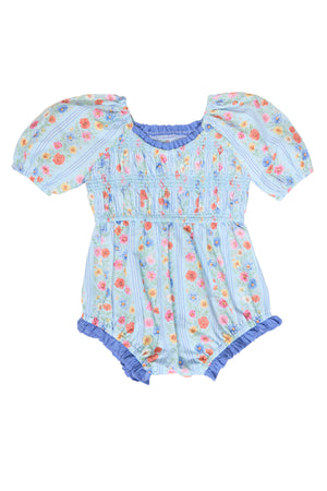 blue floral baby romper against a white background