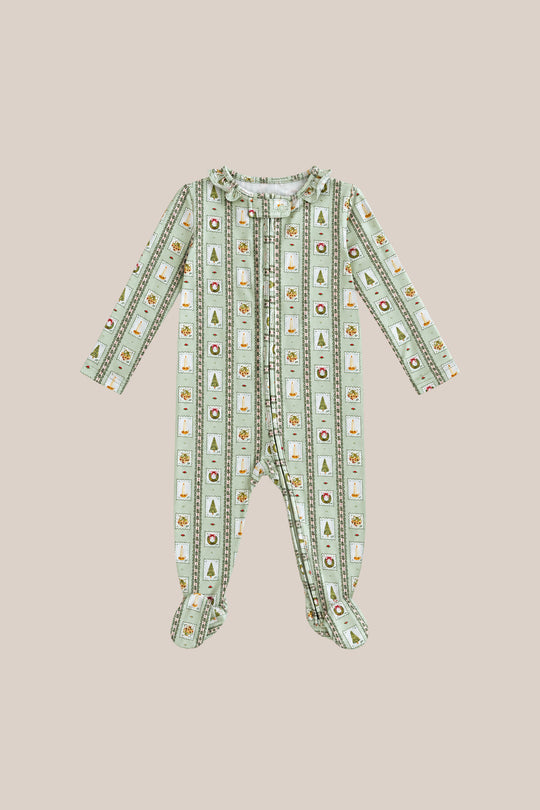 The Baby So Soft Onesie in Merry Mail Linear by Ivy City Co is a long-sleeved, footed sleeper in soft cotton-modal knit with green and white stripes plus cheerful holiday patterns, shown laid flat on beige.