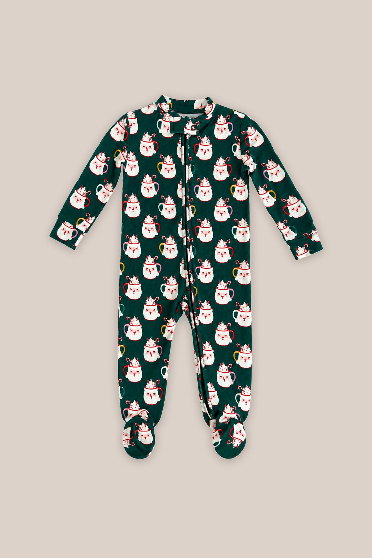 The Baby So Soft Onesie in Very Merry Santa by Ivy City Co features a dark green cotton-modal knit with white cat prints in red Santa hats, a front zipper, and long sleeves, shown on a beige background.