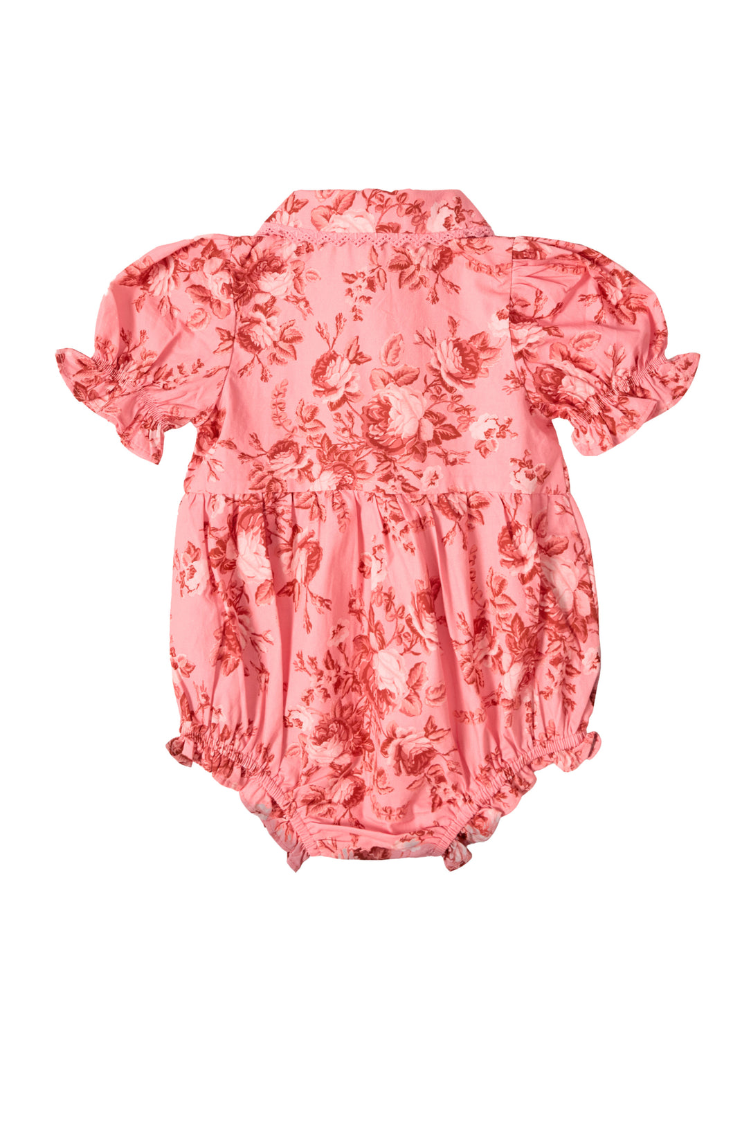 The Baby Sophia Romper in Desert Heritage Rose by Ivy City Co is a pink cotton romper with puff sleeves, ruffled edges, and a charming floral print—perfect for Easter—shown flat on a white background.