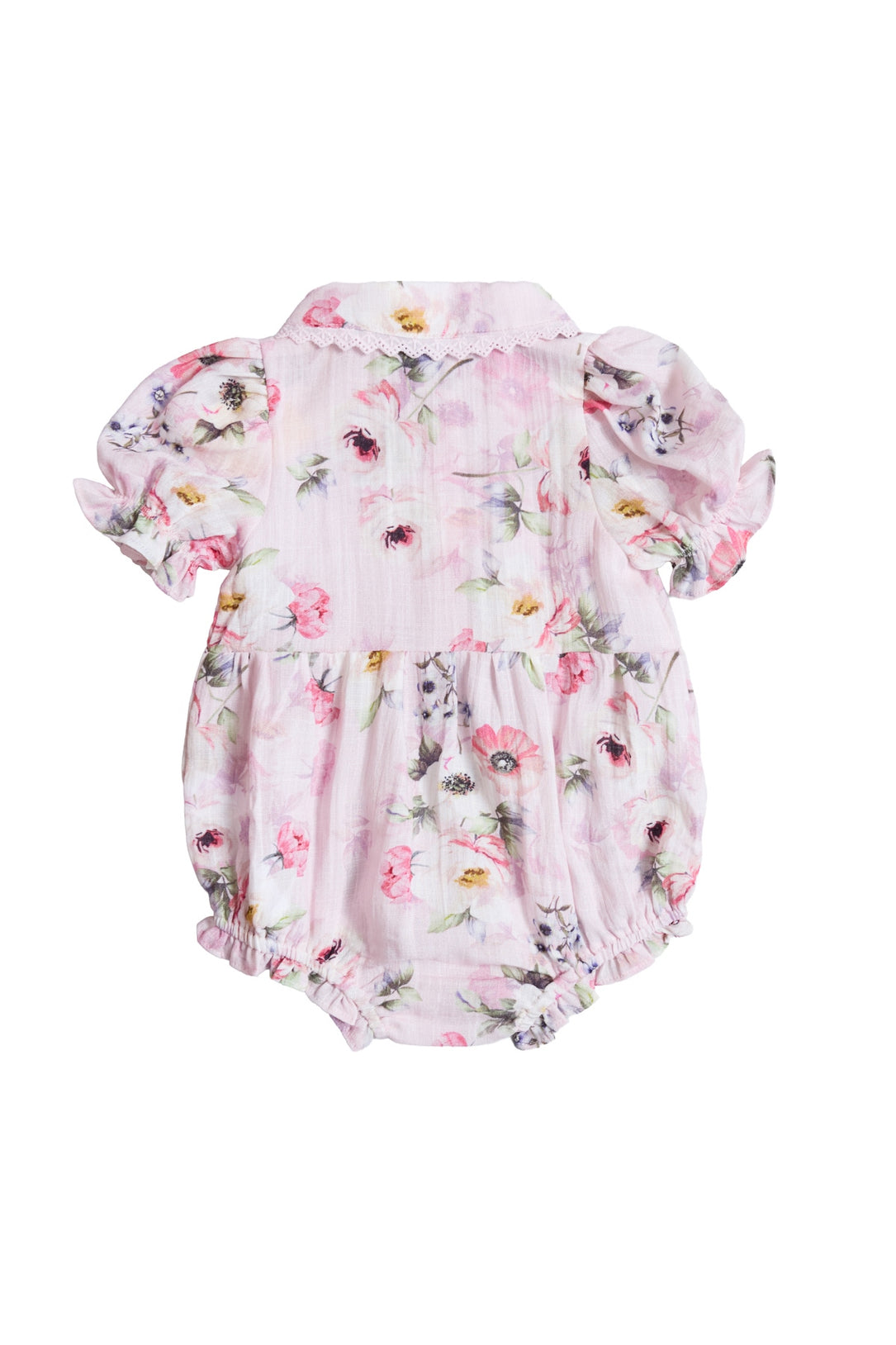 The Ivy City Co Baby Sophia Romper in Roselyn Pink has short puffed sleeves, a pink, purple, and yellow floral pattern, elastic leg openings, a small collar, and is shown from the back—ideal for mommy-and-me moments.