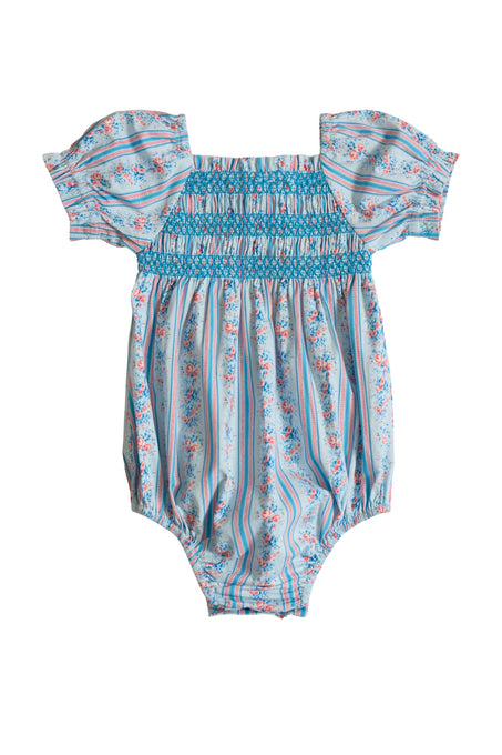 The Ivy City Co Baby Sunday Best Romper in Rosette Linear Stripe features short ruffled sleeves, blue chest smocking, and a light blue base with pink and blue stripes plus floral patterns—ideal for summer or mom and me matching outfits.