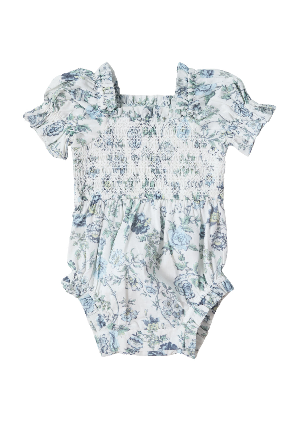 The Ivy City Co Baby Valencia Romper in Ivory Climbing Vine Bloom is a cotton baby romper with short puff sleeves, a smocked bodice, ruffled edges, and a blue floral print, shown laid flat on a white background.