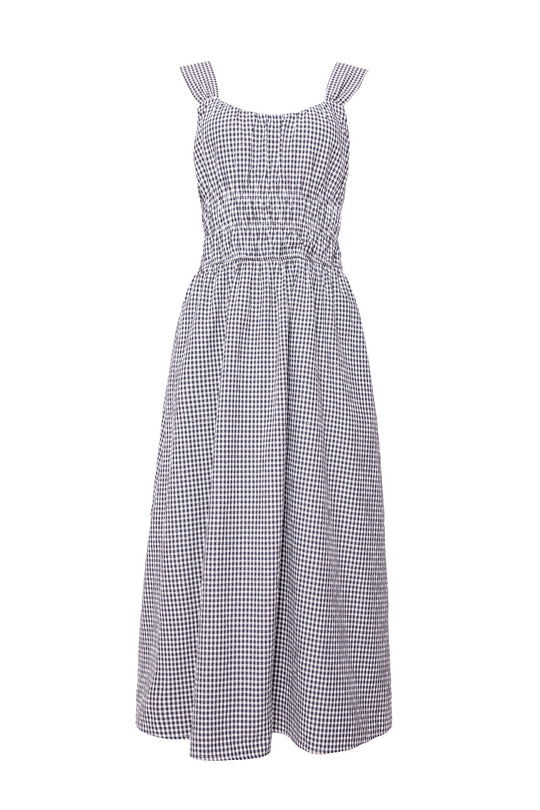 black and white gingham dress against a white background
