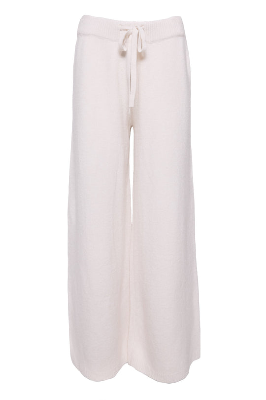 white pants in front of a white background