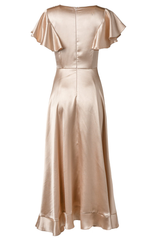 Back view of Ivy City Co's Callie Dress in Champagne Satin, a long bridesmaid dress featuring flutter sleeves, fitted waist, flared skirt, back zipper closure, and a soft sheen finish.