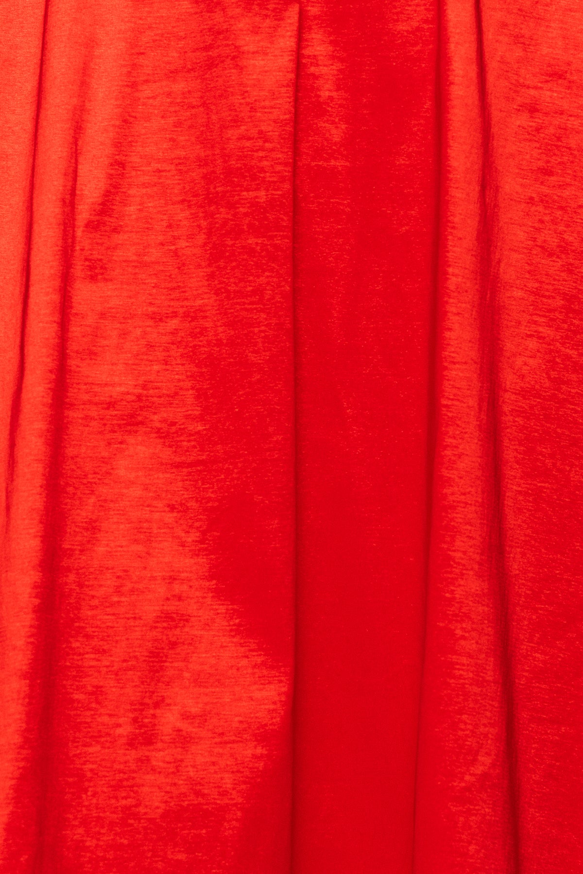 Close-up of red fabric with a textured pattern