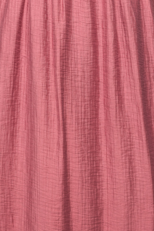 Close-up of textured pink fabric