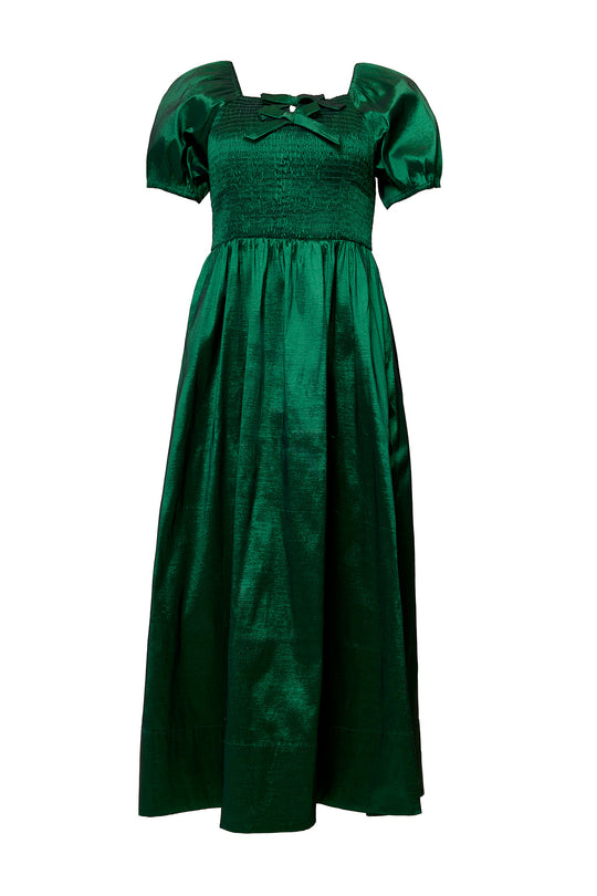 Green dress with puff sleeves on a white background