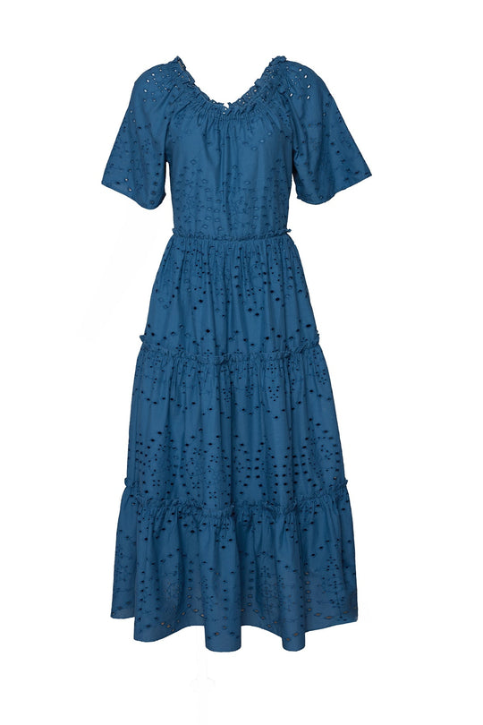 The Etta Dress in Cobalt by Ivy City Co is a summer midi dress featuring short sleeves, a gathered neckline, a tiered skirt with eyelet details, and a relaxed fit for effortless style.