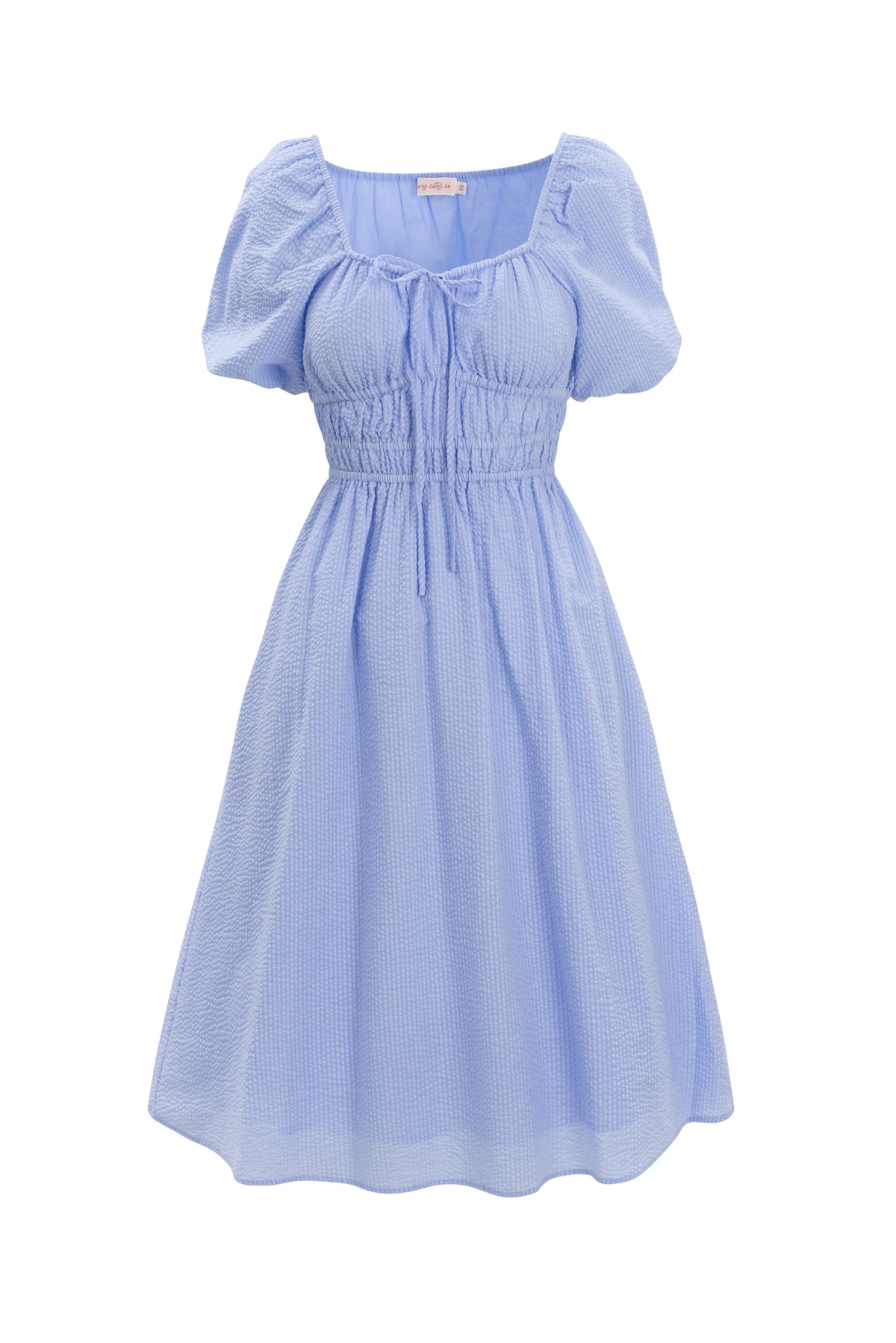 The Countryside Dress in Blue Seersucker by Ivy City Co features short puffed sleeves, a square neckline, gathered bodice with front tie, nursing-friendly design, subtle textured pattern, and a slightly flared skirt.