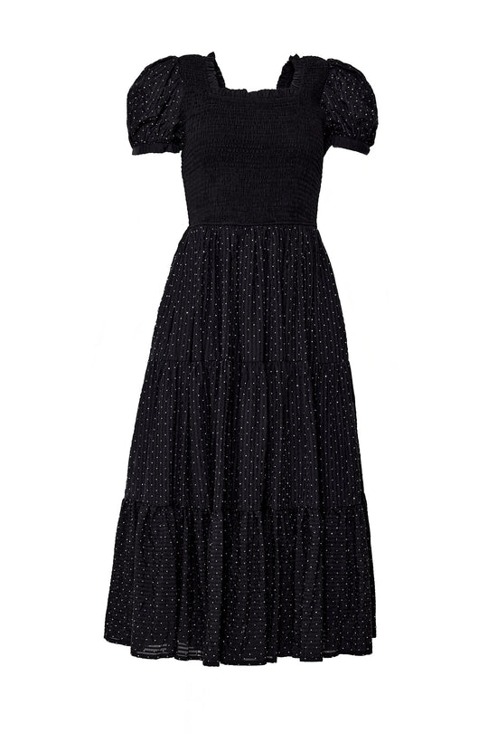 Black dress with puff sleeves on a white background