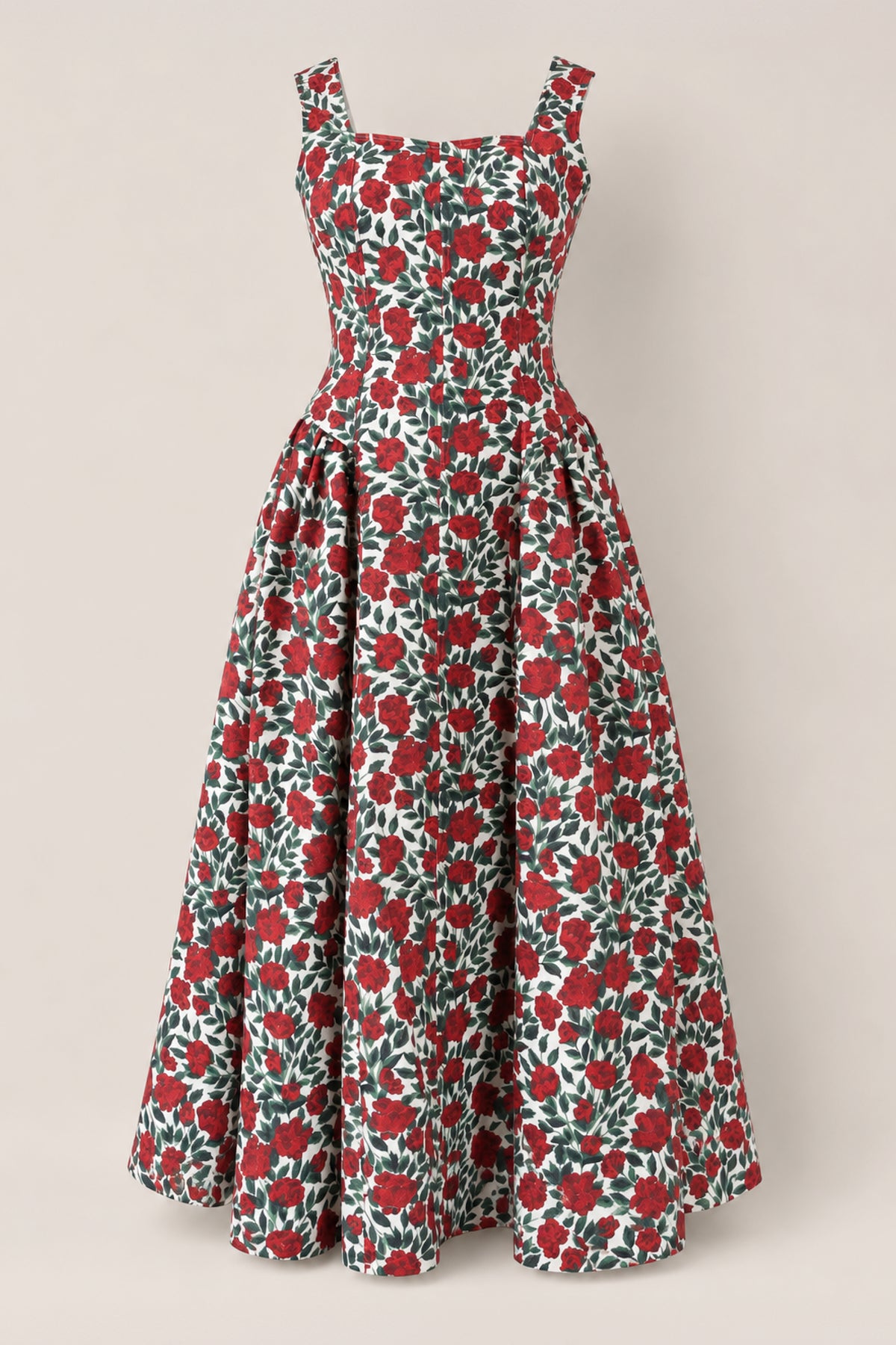 The Edith Dress in Red Roses by Ivy City Co is a sleeveless, ankle-length stretch denim dress with a fitted bodice and flared skirt, featuring a bold red rose floral print on a white background.