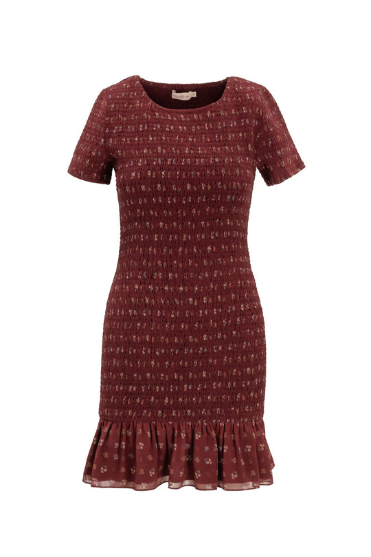The Elaine Dress in Mulberry Vine by Ivy City Co is a short-sleeved burgundy knit dress with a fitted silhouette, subtle floral pattern, and ruffled hem.