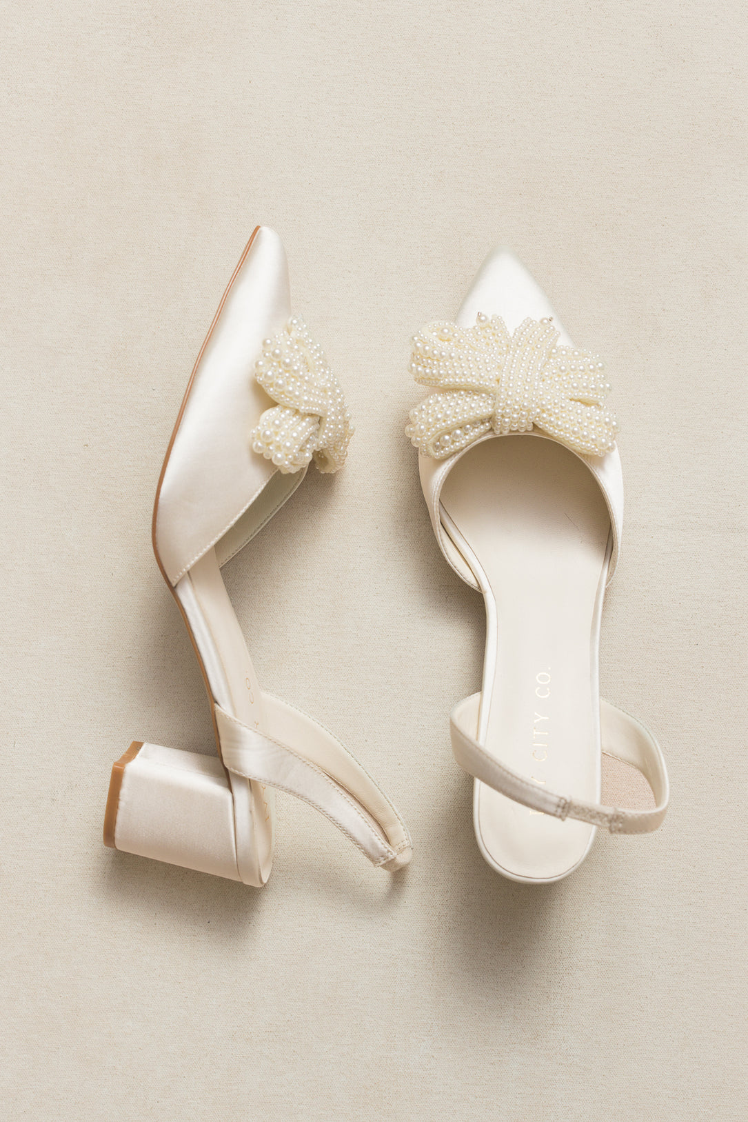 Eloise Pearl Bow Heel in Ivory