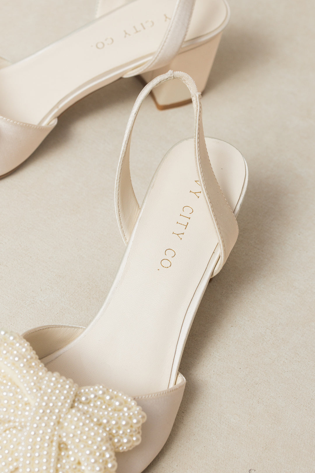 Eloise Pearl Bow Heel in Ivory