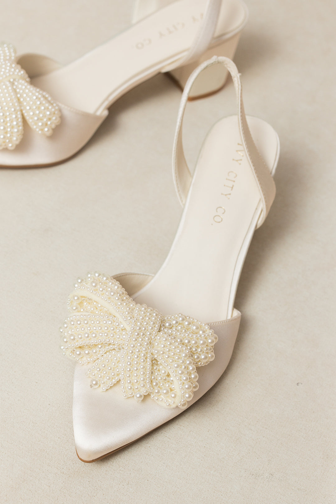 Eloise Pearl Bow Heel in Ivory