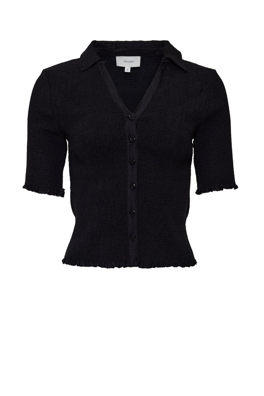 black shirt against a white background